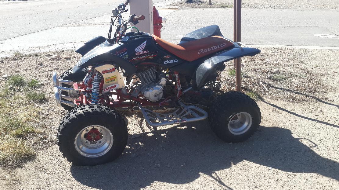 Screaming fast Racing 4Wheeler with lots of factory extras.